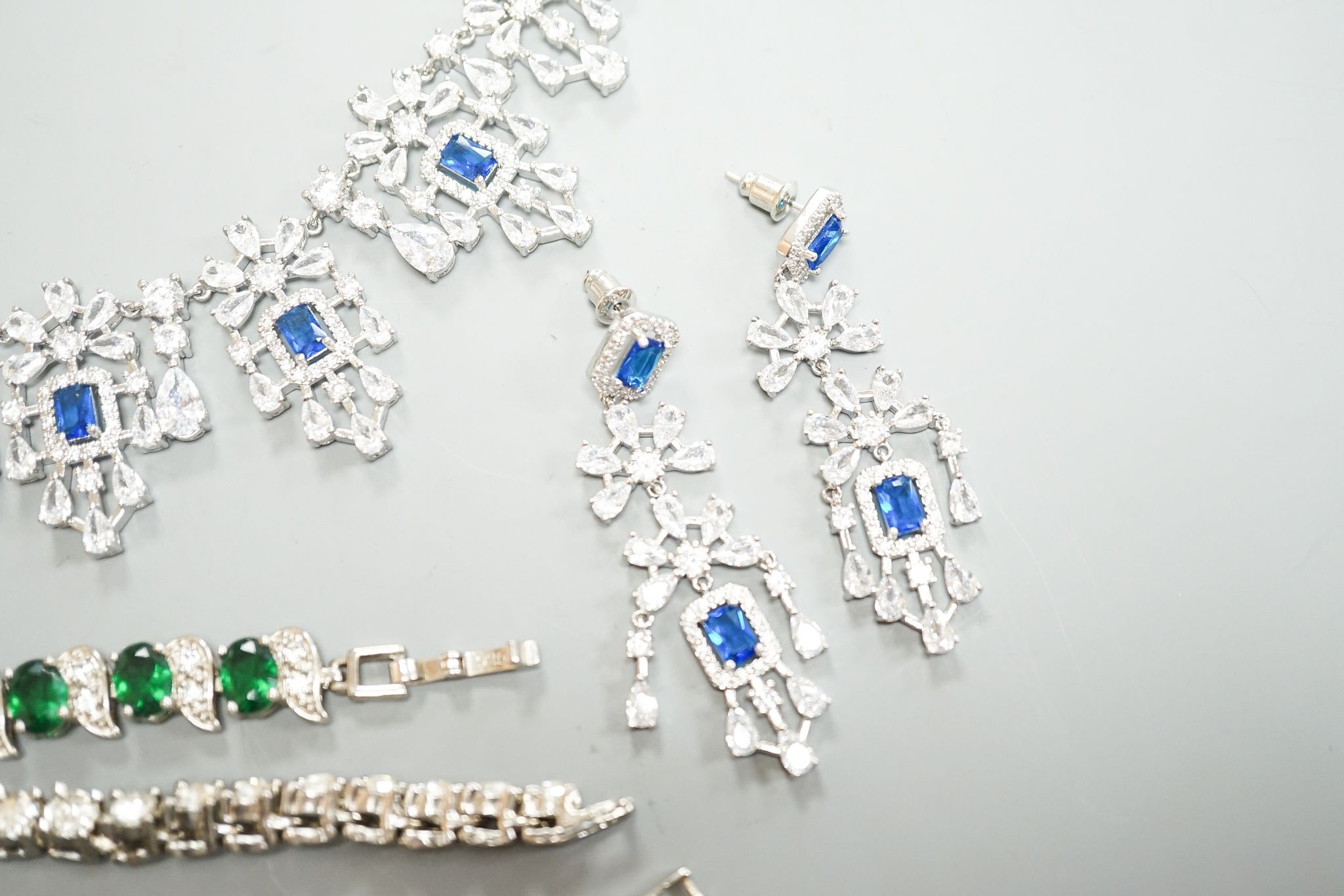 A small group of 925 or white metal and paste set jewellery, including necklaces, bracelets and earrings.